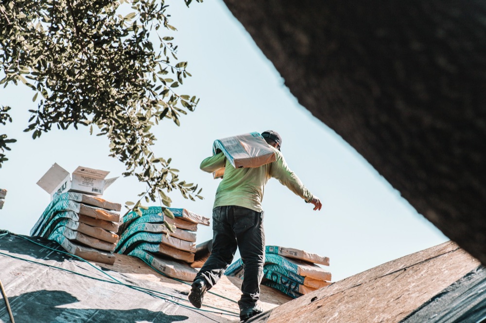 Roofer on a residential roof repair